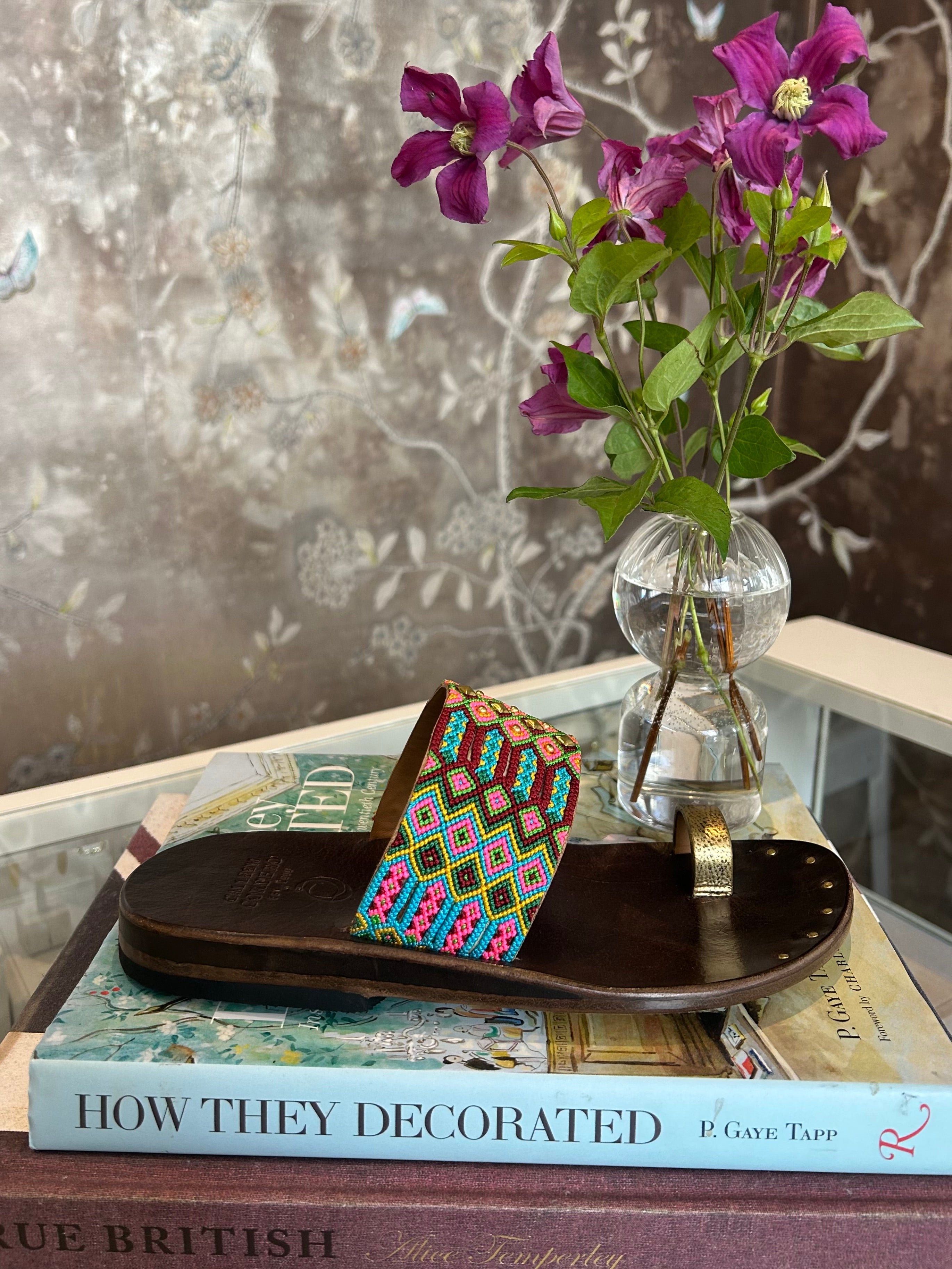 CALLEEN CORDERO | PAPI SANDAL | Multi-colored embroidered sandals | Hand crafted | Gold toe strap | Wide top-foot braided leather-lined strap | Hand-molded brown leather footbed with arch support | Rubber heel for easy walking | Charlotte, NC