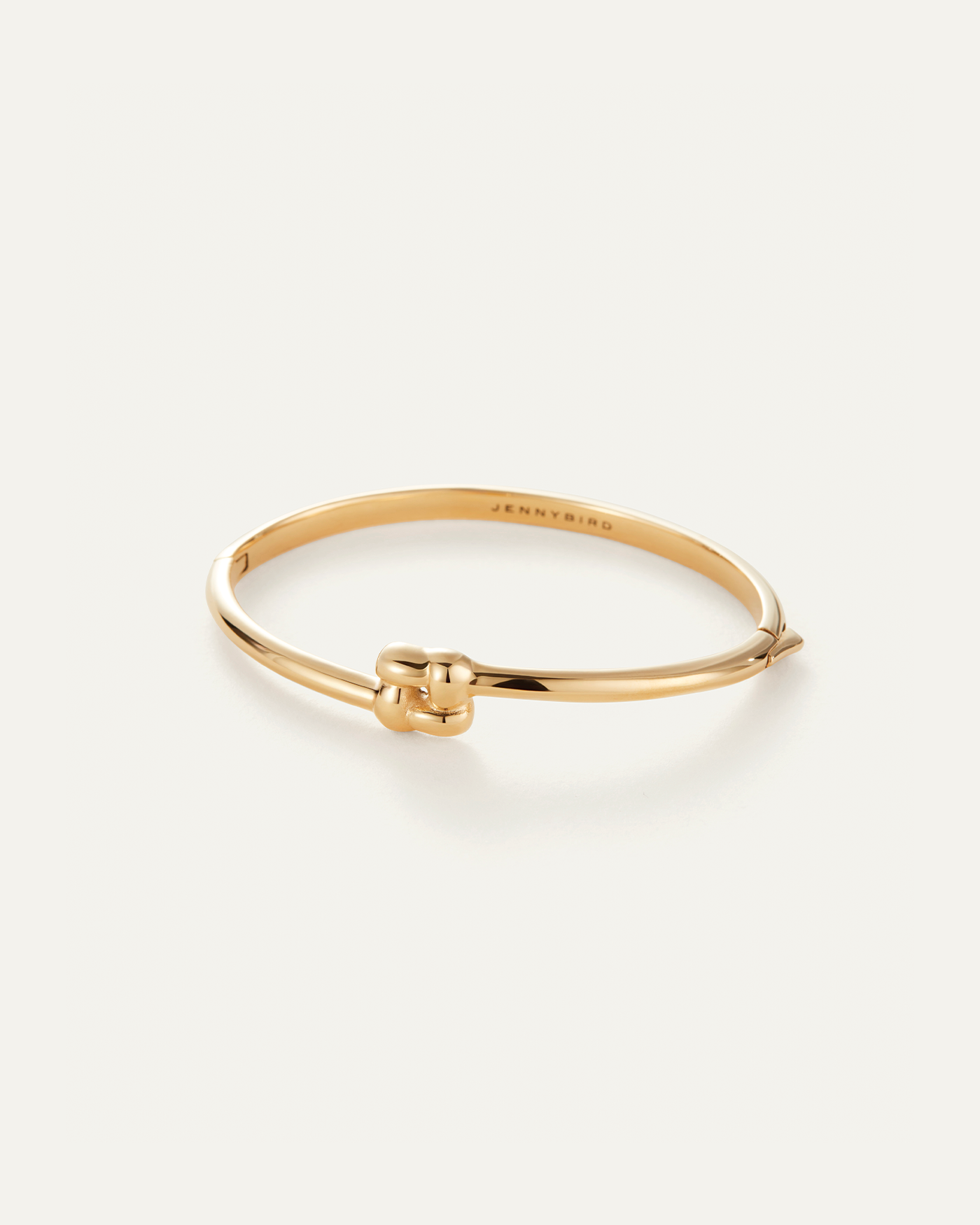 JENNY BIRD | WOVEN SLIM SQUARE BANGLE | Slim gold bangle | 14K gold plated steel | Small woven square motif | Push button closure | Imported | Available in Charlotte, NC