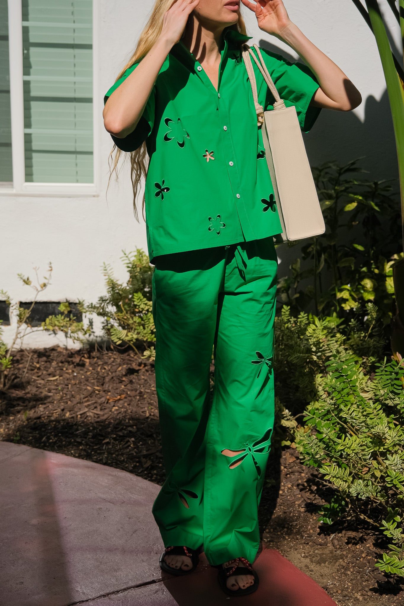 MIRA MIKATI | EMBROIDERED CUT OUT POPLIN TROUSER | Green dragonfly motif trousers | Straight-leg silhouette | Elasticated waist with drawstring | Mid rise | Composition: 100% Cotton | Dry Clean Only | Available in Charlotte, NC