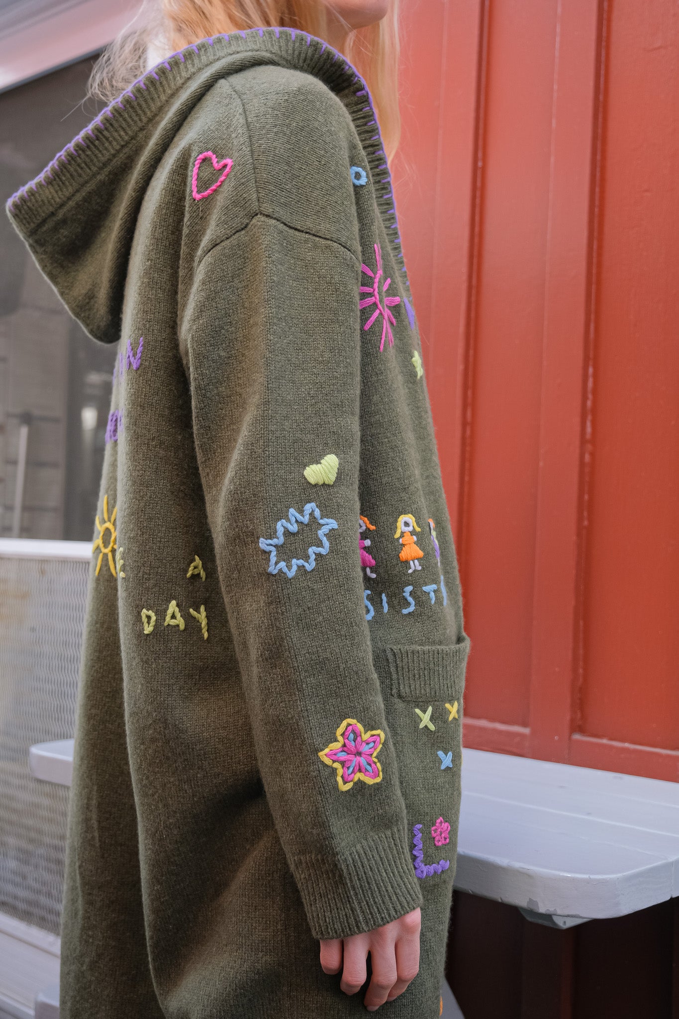 MIRA MIKATI | LONG DOODLE CARDIGAN | Long knit cardigan | Open front | Hooded | Front patch pockets | Multi-colored doodle embroidery throughout | Composition: 55% RWS wool, 25% recycled polyamide, 20% organic cotton | 
Care: Gentle hand wash or dry clean | Made in China | Charlotte, NC