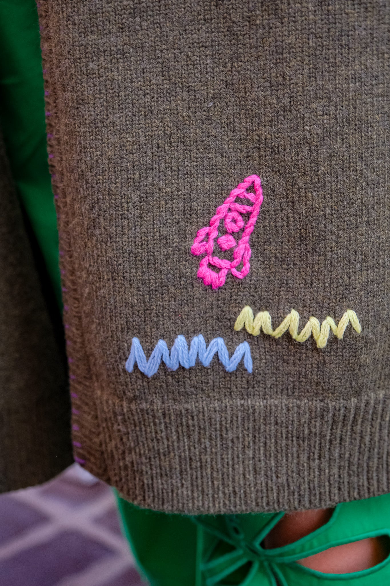 MIRA MIKATI | LONG DOODLE CARDIGAN | Long knit cardigan | Open front | Hooded | Front patch pockets | Multi-colored doodle embroidery throughout | Composition: 55% RWS wool, 25% recycled polyamide, 20% organic cotton | 
Care: Gentle hand wash or dry clean | Made in China | Charlotte, NC