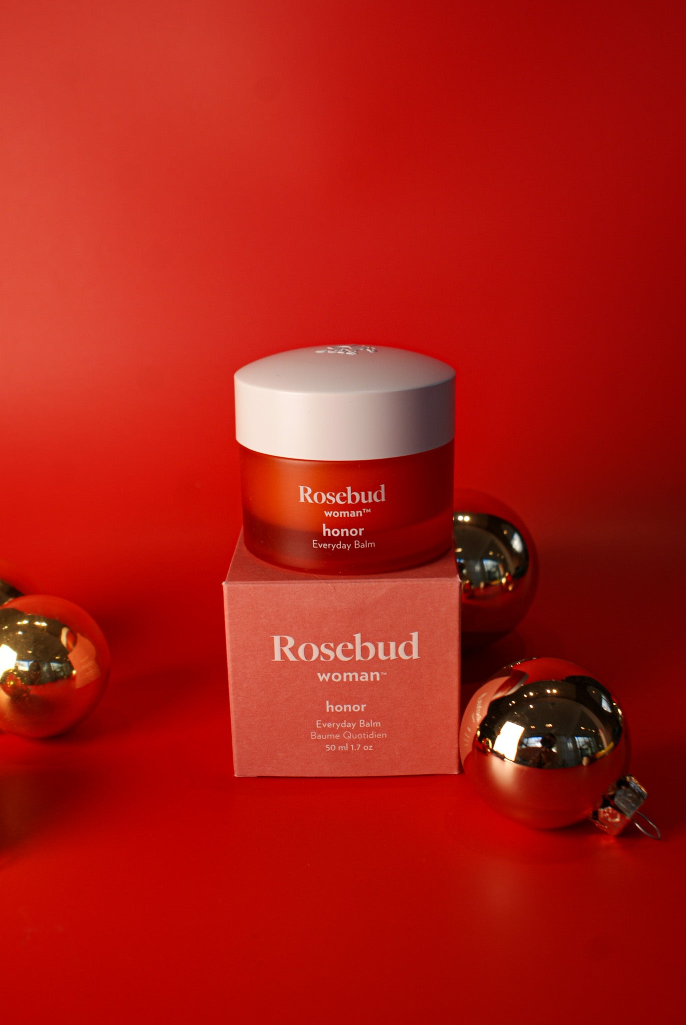 ROSEBUD | EVERYDAY BALM | Red jar with white top, on red background, Charlotte, NC
